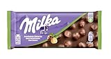 Milka Schokoladentafel mit Alpenmilch mit ganzen Haselnüssen, 95 g