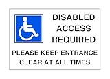 Parkplatzschild mit Aufschrift 'Disabled access required please keep...