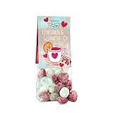 Eisblumen und Glühweinherzen, süße Bonbons in einem hübsch verpackten...